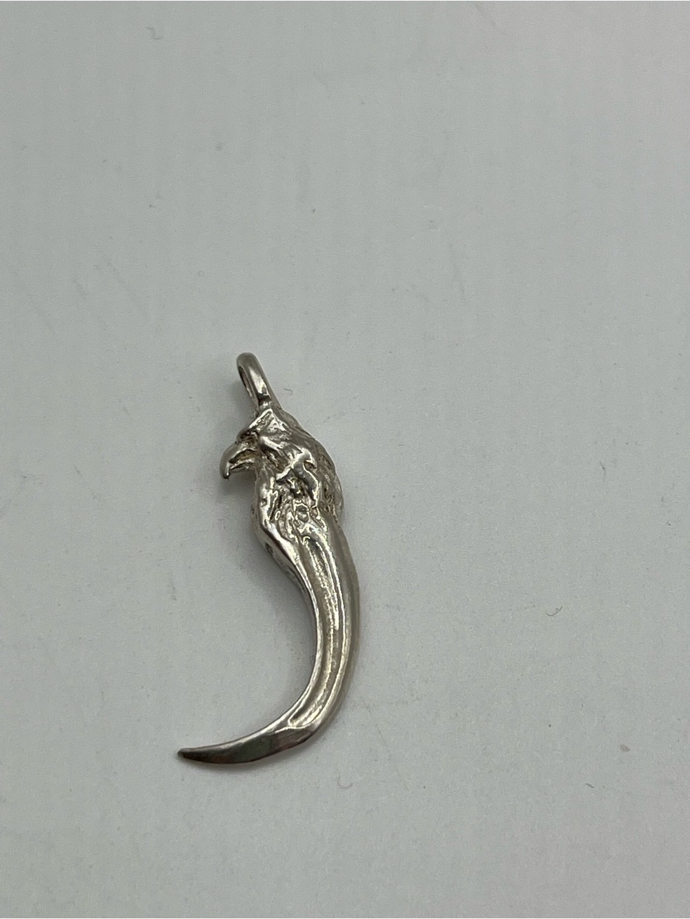 Silver Eagle Claw Pendant with eagle head . Sterling.